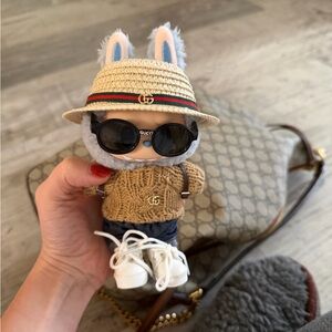 Labubu in Gucci outfit